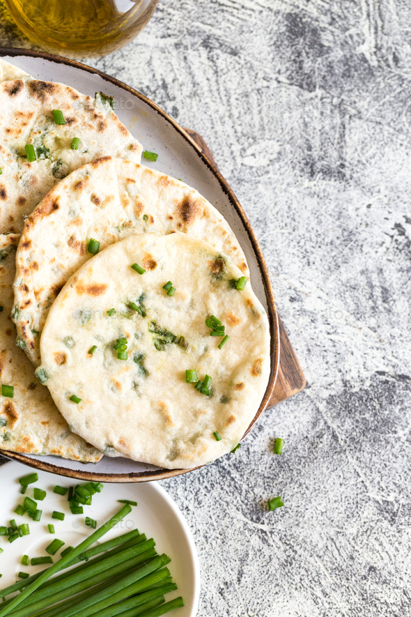 Onion naan traditional indian bread. pita bread Stock Photo by Ivannag82